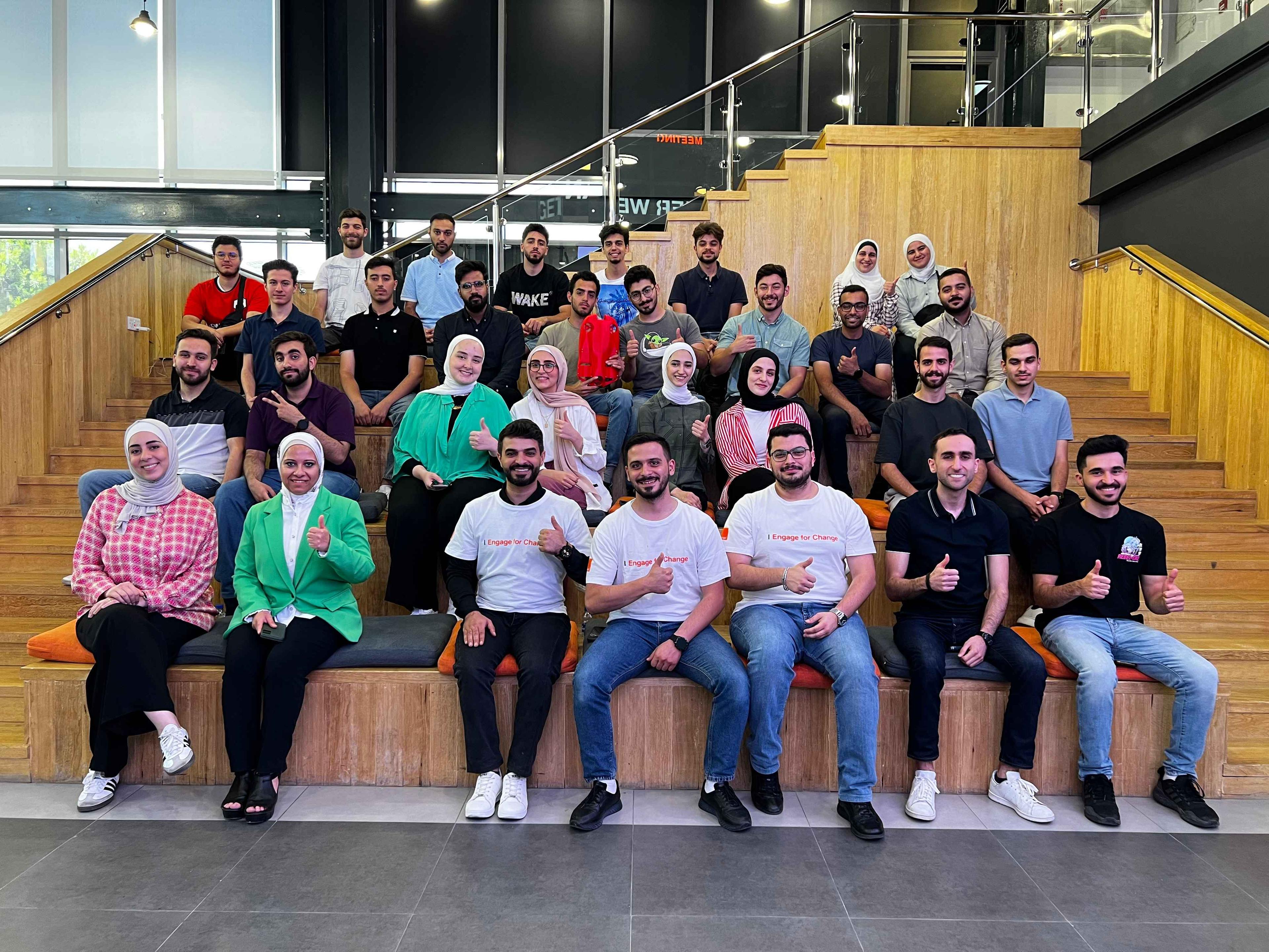 Under the Umbrella of Engage for Change  Employees Volunteer to Enhance Skills of Orange Jordan Summer Challenge 2024 Students