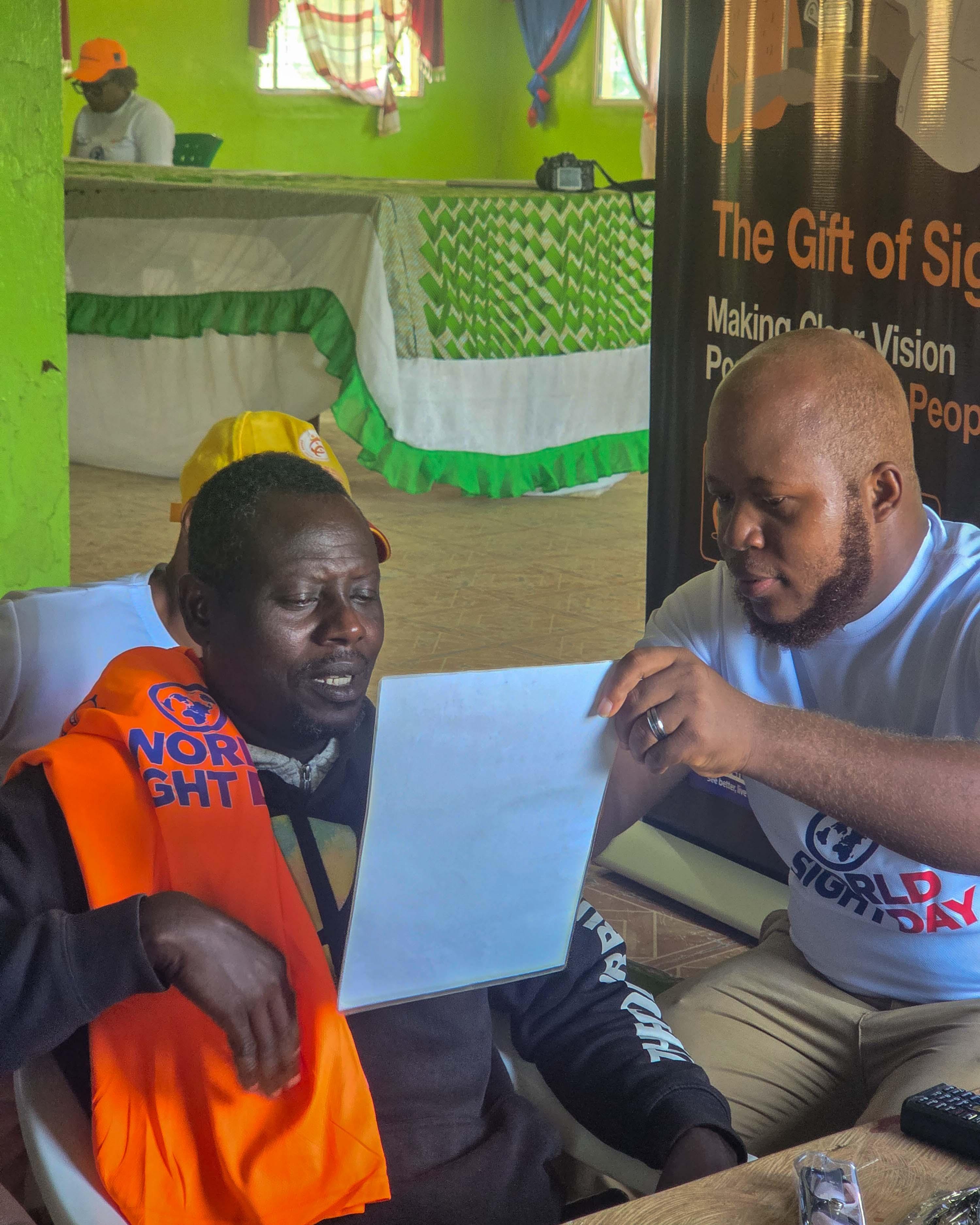 Elderly male being screened