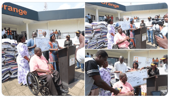 Orange Liberia donated some food items and cash to the Group of 77 